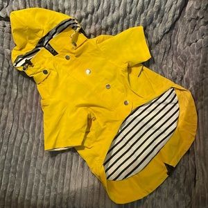 Dog Raincoat large ( see chart). Zips and snaps with a removable hood.100% nylon